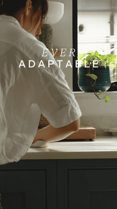 Adora Blend-in-Bottle refillable spray bottle in use for eco-friendly home cleaning – brand message ‘Ever Adaptable